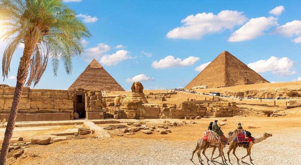 Iconic image of the Great Sphinx, a colossal limestone statue in Giza, Egypt, featuring the body of a lion and the head of a human